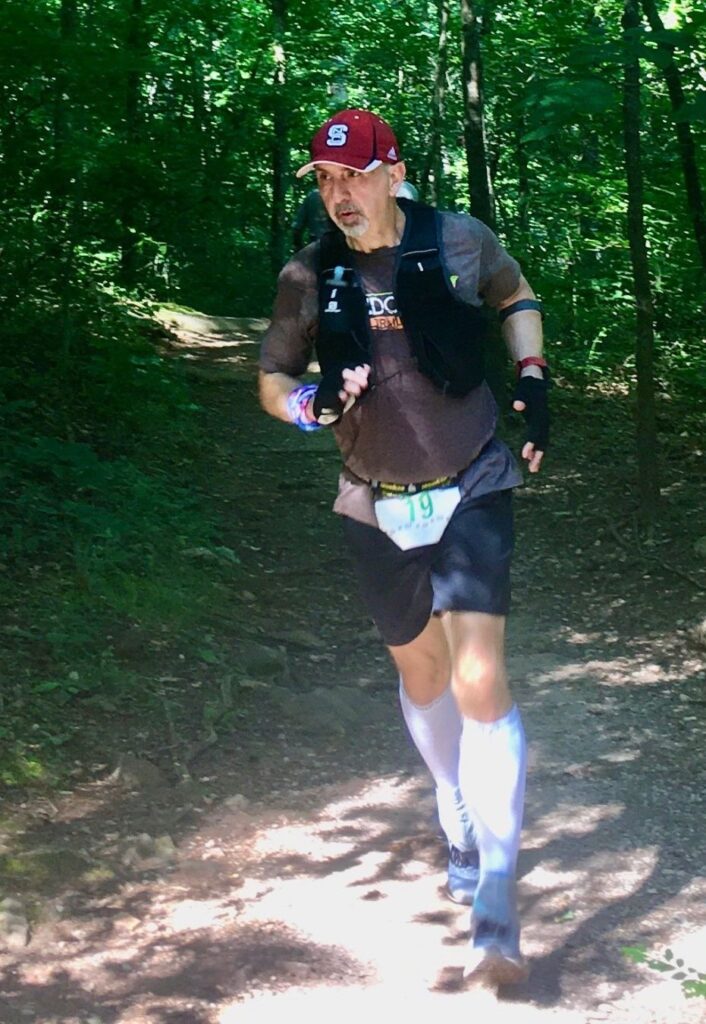 Man running on trails