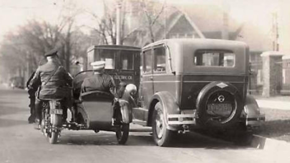 Photo of police motorcycle with sidecar circa 1932.