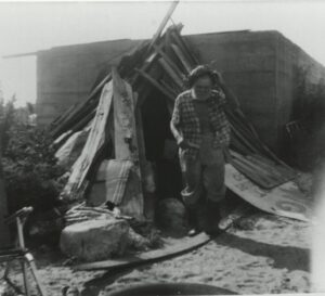 The Fort Fisher Hermit in front of his bunker home.